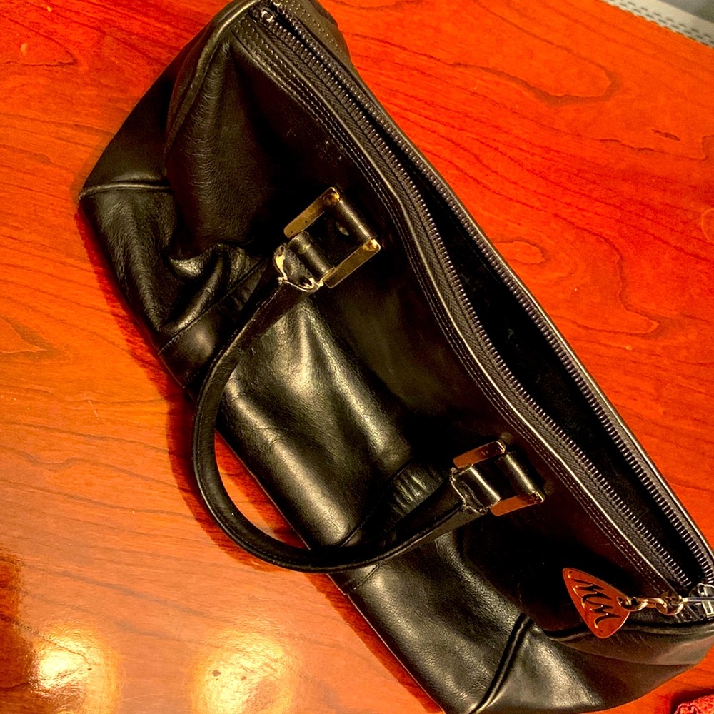 Morris Moskowitz black leather handbag